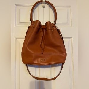 Mezzi Italian leather bucket bag. Camel colour. Black Suede interior.